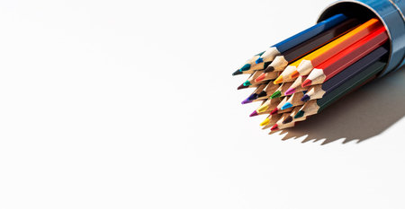 A set of colored pencils for drawing on a white background. Marketing in business sales. Banner with...