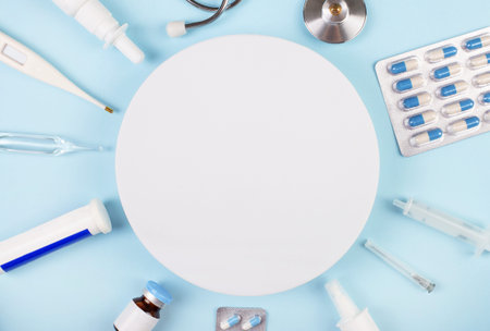 Light blue medical background. Flat lay, top view. healthcare medicine concept. Mockupの写真素材