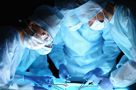 Team surgeon at work in operating room.の写真素材