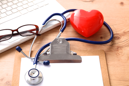 Stethoscope on laptop keyboard. Concept 3D image.の写真素材