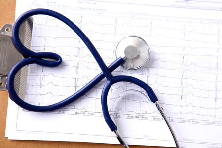 stethoscope in the shape of a heart on the table. Concept 3D image.の写真素材