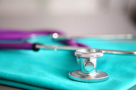 Stethoscope on a background of medical coat.の写真素材