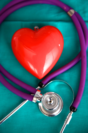 Stethoscope on a background of medical coat.の写真素材