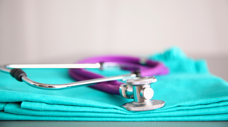 Stethoscope on a background of medical coat.の写真素材