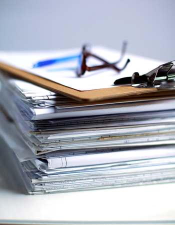 Big stack of papers ,documents on the desk .の写真素材