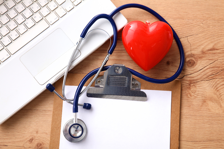 Stethoscope on laptop keyboard. Concept 3D image.の写真素材