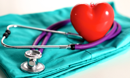 Stethoscope on a background of medical coat.の写真素材