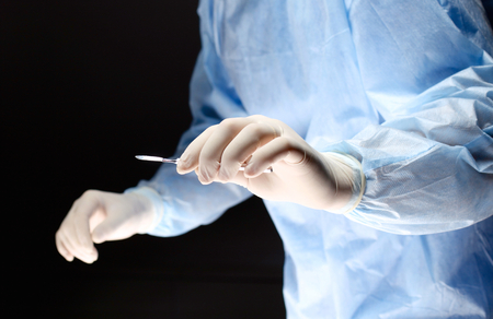 Surgeon getting ready to operate.の写真素材