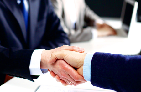 Business meeting at office. handshake in office.の写真素材