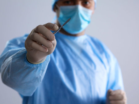 Surgeon in uniform close-up ready to step.