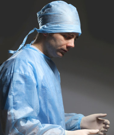 Surgeon in uniform close-up ready to step.