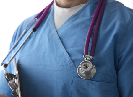Close-up of unknown female doctor with stethoscope isolated.の写真素材