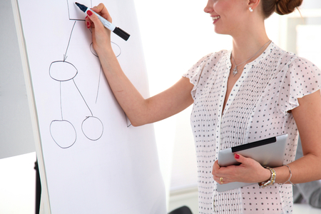 Doctor at work, close up of male doctor typing on a laptop.の写真素材