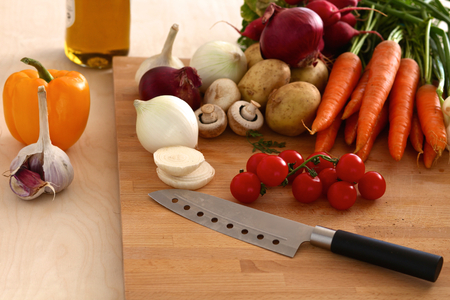Composition with assorted raw organic vegetables wooden table.の写真素材