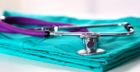 Stethoscope on a background of medical coat.の写真素材