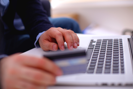 businessman working at a computer hands closeup.の写真素材