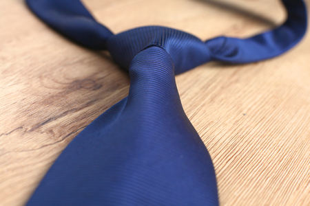 Elegance ties on wooden table, closeup.の写真素材