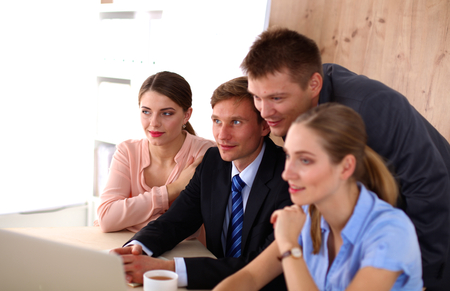 Business meeting -  manager discussing work with his colleagues.の写真素材