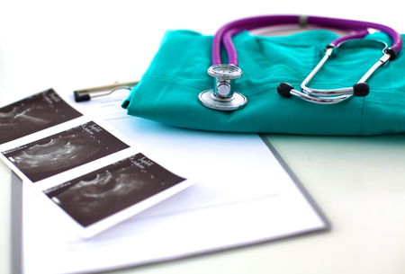 Medical stethoscope and laptop on the table.の写真素材