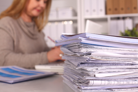 Portrait of a business woman in an office.の写真素材