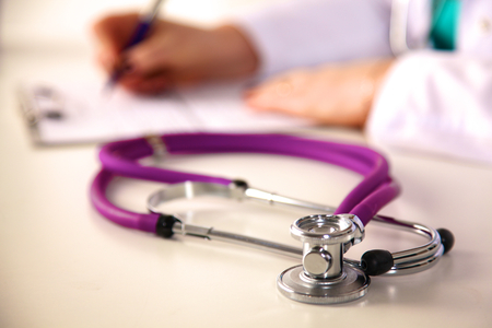 Portrait of happy medical doctor woman in office.の写真素材