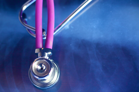 Beautiful stethoscope with reflection and blue tint.の写真素材