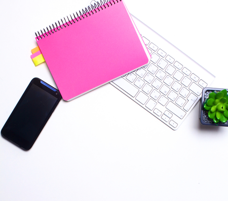 open daily, a computer and a smartphone on the desktop in the office.の写真素材