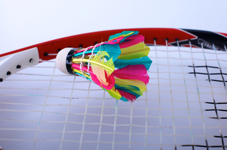 Close-up of badmington rackets with balls on a blue backgroundの写真素材