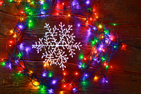 Christmas rustic background - vintage planked wood with lights and free text spaceの写真素材