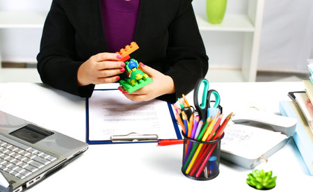 the woman behind the desk in the Officeの写真素材