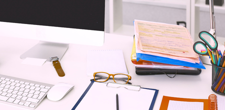 office desk a stack of computer paper reports work formsの写真素材