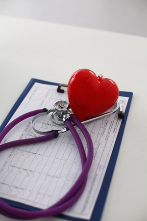 Doctor stethoscope heart on your desktopの写真素材
