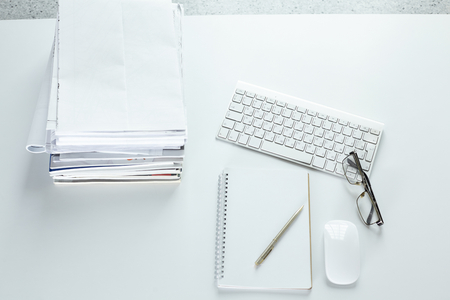 Workspace desktop, documents on the office tableの写真素材