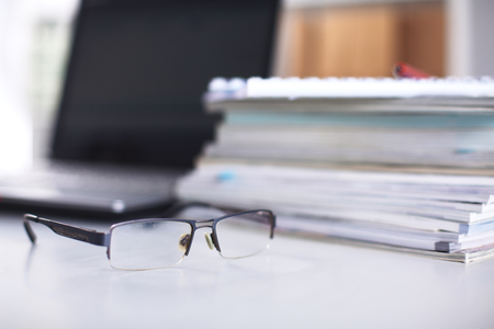 Workspace desktop, documents on the office tableの写真素材