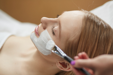 cosmetology and treatment concept - close up of beautiful youngの写真素材