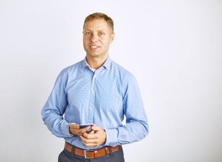 Business man with a smartphone in his hands