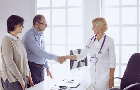 Couple at reception discussing issues with a sexologistの写真素材
