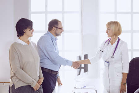 Couple at reception discussing issues with a sexologistの写真素材