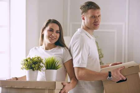 happy Young couple moving in new homeの写真素材