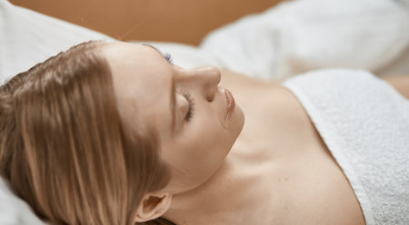 Beautiful young woman in cosmetic salon close upの写真素材
