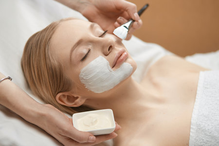 Beautiful young woman in cosmetic salon close upの写真素材