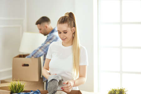 happy Young couple moving in new homeの写真素材