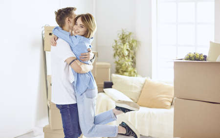 Doctor with laptop and pregnant woman in doctors officeの写真素材