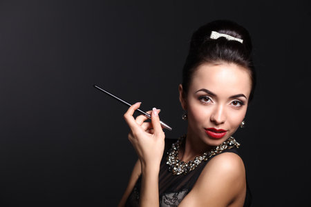 Portrait of young beautiful woman with jewelry