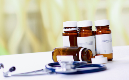 Stethoscope and bottle pillsの写真素材