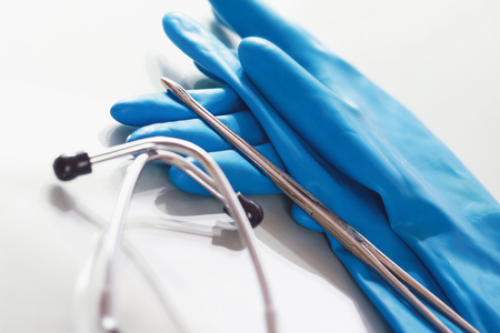 stethoscope with a rubber glovesの写真素材