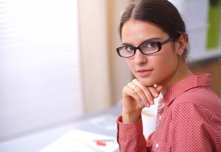 Young fashion designer working at studio.の写真素材