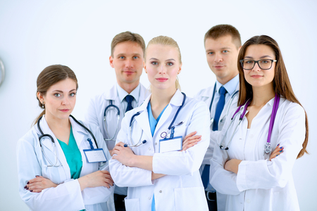 Portrait of group of smiling hospital colleagues standing togetherの写真素材