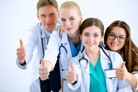 Portrait of doctors team showing thumbs upの写真素材