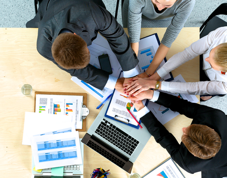 Business team with hands together - teamwork conceptsの写真素材